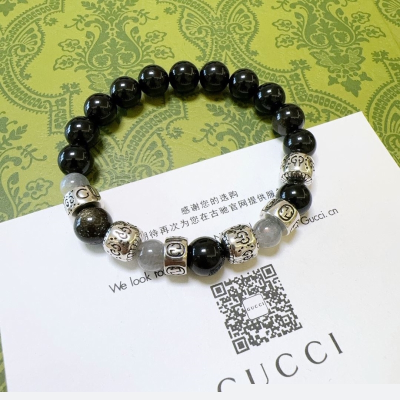 G*u*i bracelets